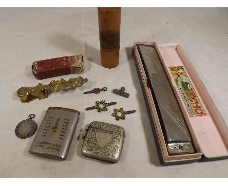 A small mixed lot comprising a Sovereign scale, a Hohner Echo harmonica in case, two vestas, various winding keys and other