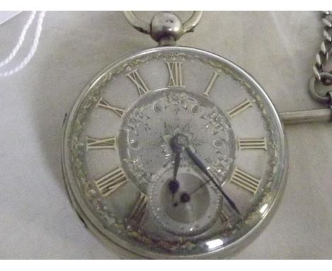 A gentleman's silver cased pocket watch, the case having assay marks for London 1877, silvered engine turned and engraved dia