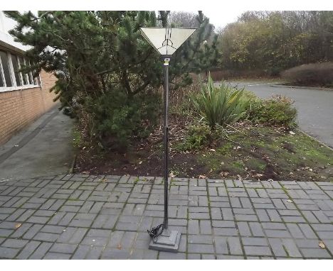A good quality standard lamp with a Tiffany style shade