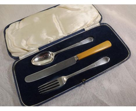 A George VI cased silver knife, fork and spoon set, Sheffield assay 1937