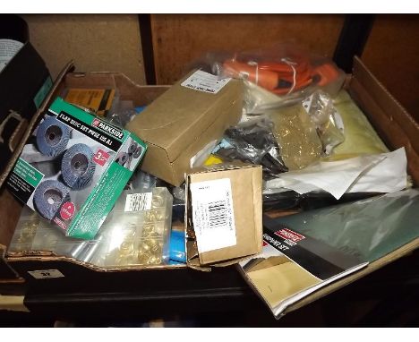 A quantity of tools and hardware, predominately unused