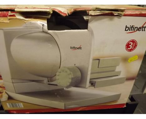 A Bifinett Universal Slicer with instruction manual, boxed