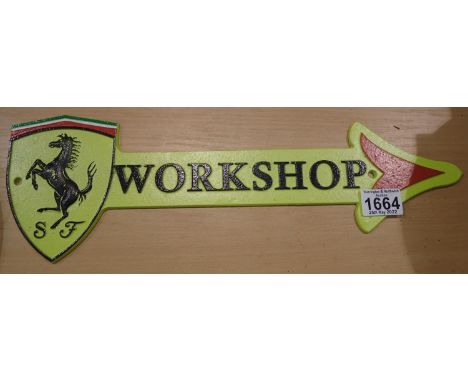 Cast iron yellow Ferrari large workshop arrow plaque, 40 x 12 cm. P&amp;P Group 2 (£18+VAT for the first lot and £3+VAT for s