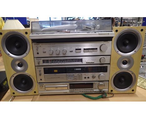 Technics stacking music centre with record player, radio, cassette, CD player and amplifier. Not available for in-house P&amp