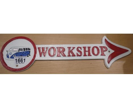 Cast iron VW workshop arrow sign, 40 x 12 cm H. P&amp;P Group 2 (£18+VAT for the first lot and £3+VAT for subsequent lots) 