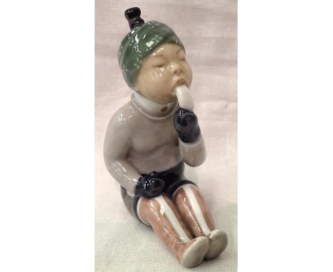 Royal Copenhagen Greenland Girl girl by George K Strand in 1927, H: 10 cm. P&amp;P Group 1 (£14+VAT for the first lot and £1+