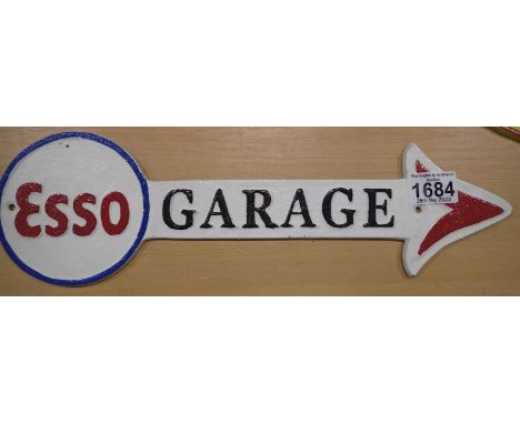 Cast iron Esso Garage arrow sign, 30 x 10 cm. P&amp;P Group 2 (£18+VAT for the first lot and £3+VAT for subsequent lots) 