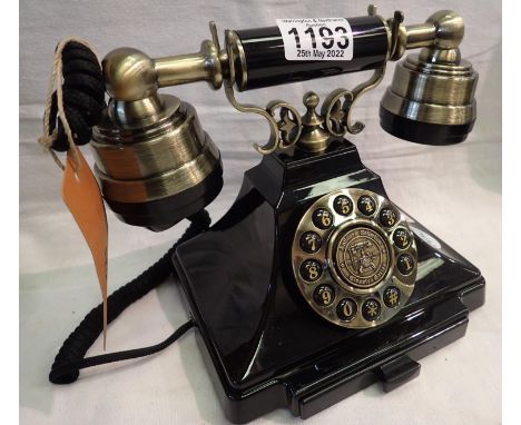 The Duke is a 1920s style push button telephone with a black &amp; brass finish and traditional cloth handset curly cord. Com