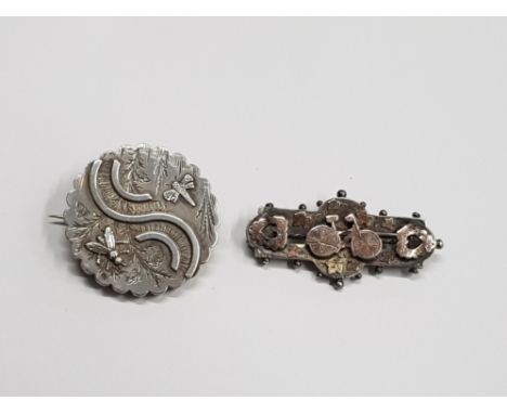 2 VERY UNUSUAL VICTORIAN SILVER BROOCHES INCLDUES LARGE LOCKET BACKED BUG BROOCH AND A 1896 BROOCH SHOWING A BICYCLE