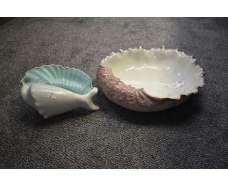 A giant ceramic Turners dish in the form for a sea clam, decorated having gold colour bird and foliage motifs, impressed mark