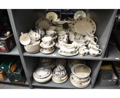 A large collection of Royal Doulton Camelot pattern tea/dinner wares, to include egg cups, milk jugs, saucers, platters ect, 