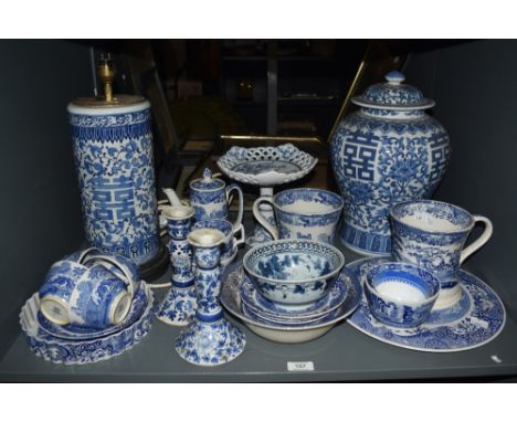 A large Chinese blue and white porcelain baluster lidded ginger jar, makers mark to base, decorated in the Chinoiserie style,
