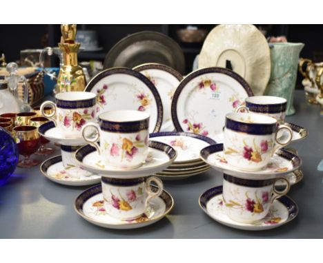 A Regent China part tea service, having gilt edging and hand coloured with foliage on a white ground, (24).