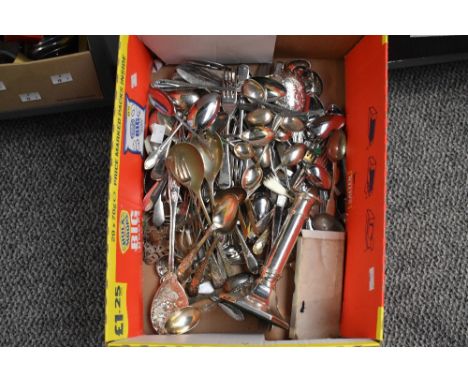 A box containing various silver plated cutlery, to include a candle stick, a large soup spoon, a boxed set of 5 tooth picks e
