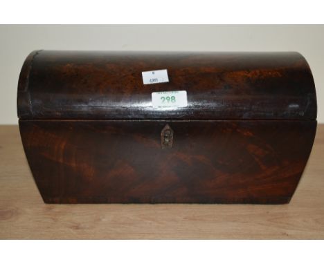 A 19th century flame mahogany dome topped tea caddy, having brass handles to either side, the velvet lined interior have two 