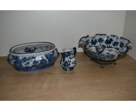 An Ironstone blue and white jardinere, decorated with Chinese landscape scene (missing handles), sold together with a ceramic