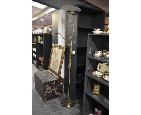A stylish polished brass floor lamp, having central reading light, h182cm.