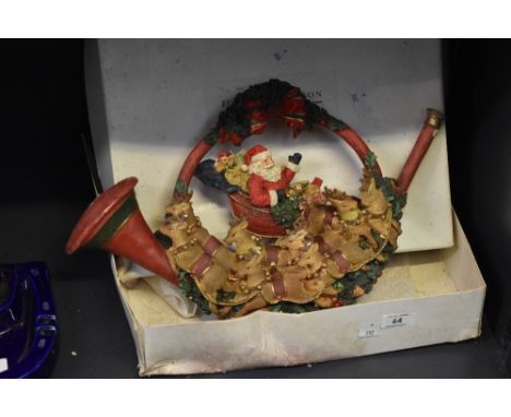 A mid / late 20th century Christmas Santa decorated round a painted brass bugle, h26cm, sold together with a Fortnum and Maso