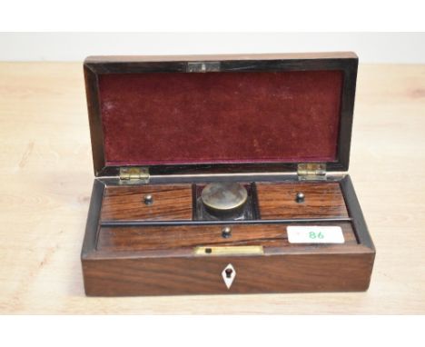 A 19th century rosewood writing box with pen, nib boxes, inkwell and comes with key 18.5x8.5cm