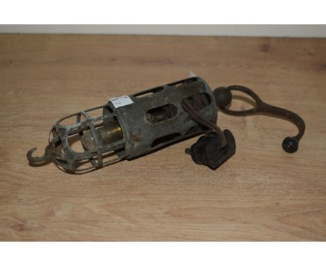 An early 20th century brass vehicle inspection lamp, having bird cage design, 26cm