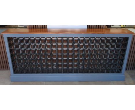 A good quality wine rack holding 140 bottles with a polished top and painted base - Width 203cm x Height 90cm