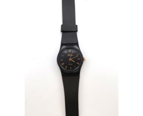 A Hermes quartz movement wristwatch with black case and rubberised strap, new battery fittend and apparently workingm togethe