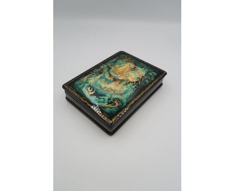 A Russian Lacquer Miniature box. Father Frost/Winter Landscape by Maslova. Approximately 18.5 by 14cms.