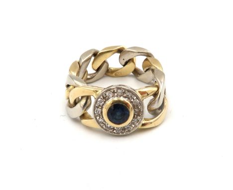 A sapphire and diamond cluster 'chain' ring. Size M 1/2. Tests gold 18ct. Weight 7.41 grams