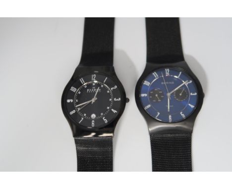 A Skagen of Denmark, the signed black dial with Arabic numerals to the outside chapter ring, with internal twenty four hour c