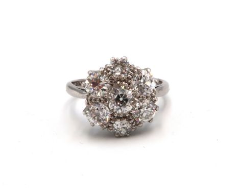 An Art Deco designed, 1930's style diamond, platinum and 18ct white gold flowerhead ring - transitional cut diamonds estimate
