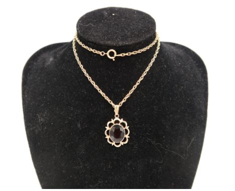 A 9ct Yellow Gold Garnet Pendant on a 9ct Yellow Gold Chain, Pendant approx. 21mm x 16mm not including the Suspension Loop, C