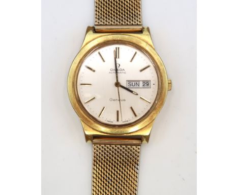A gentleman's vintage gold plated Omega wristwatch, with day/date aperture, baton numerals, stainless steel signed back, auto