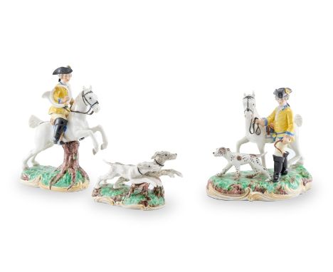 3-tlg. JagdgruppeJäger mit Pferden und Hunden, Nymphenburg um 1975. Aus der "Gelben Jagd". Jeweils Sockel m. Gras- Oberfläche