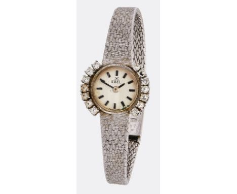 Kl. Damenarmbanduhr Ebel,Schweiz 1960/70er Jahre. 18 kt WG. Handaufzug. Werk-Nr. Ebel 61. Gehäuse-Nr. 57719. Rundes Gehäuse. 