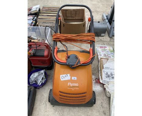 A FLYMO ELECTRIC LAWNRAKE COMPACT 340 SCARIFIER
