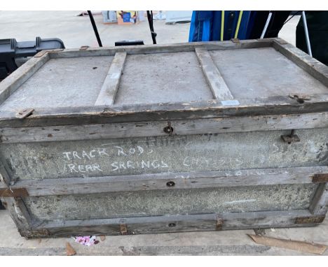 A VINTAGE WOODEN BANDED GALVANISED TRUNK