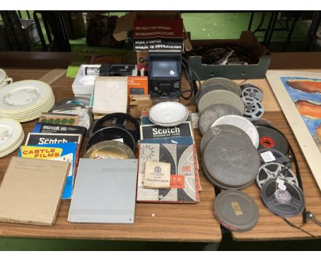 A QUANTITY OF VINTAGE FILM REELS TOGETHER WITH A FILM EDITOR VIEWER, VINTAGE CAMERA, MAGNETIC TAPE ETC.,