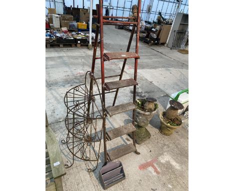 A WOODEN AND METAL STEP LADDER, A THREE TIER METAL UNIT AND A LETTER RACK