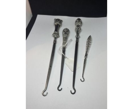 FOUR HALLMARKED BIRMINGHAM SILVER HANDLED BUTTON HOOKS