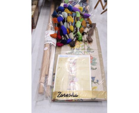 A LARGE QUANTITY OF TAPESTRY WOOLS, A TAPESTRY KIT PLUS A HAND ROTATING TAPESTRY FRAME