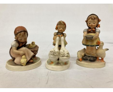 THREE GOEBEL HUMMEL FIGURES TO INCLUDE "CHICK GIRL" NO. 57/0 - "GOOSE GIRL" NO. 473/0 AND "BE PATIENT" NO. 197 2/0