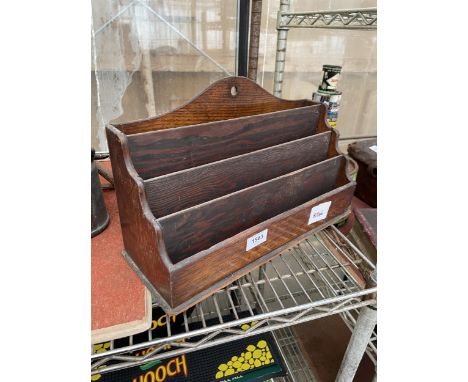 A VINTAGE OAK LETTER RACK