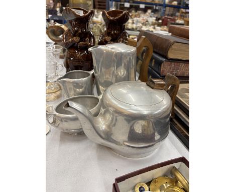 A VINTAGE PICQUOT WARE TEASET TO INCLUDE A TEAPOT, HOT WATER POT, CREAM JUG AND SUGAR BOWL