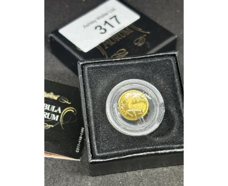 A 24 CARAT GOLD FABULA AURUN 2009 HALF CROWN PROOF COIN IN A PRESENTATION BOX