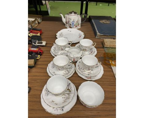 A VINTAGE WINDSOR 'EASTERN MELODY' TEASET TO INCLUDE A CAKE PLATE, CREAM JUG, SUGAR BOWL, CUPS, SAUCERS AND SIDE PLATES PLUS 