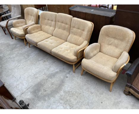 AN ERCOL JUBILEE THREE PIECE SUITE COMPRISING THREE SEATER SETTEE AND TWO EASY CHAIRS