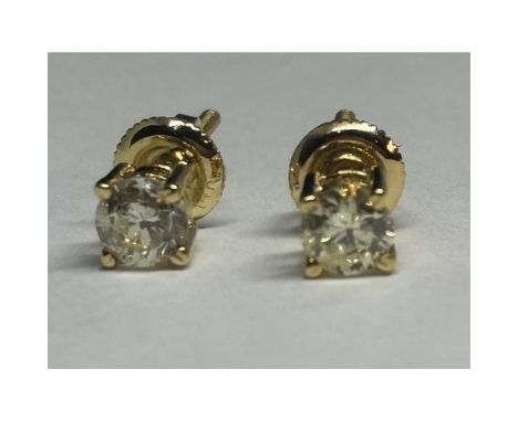 A PAIR OF 14 CARAT YELLOW GOLD SOLITARE DIAMOND STUD EARRINGS TOTAL DIAMOND WEIGHT 0.5 CARATS IN A PRESENTATION BOX WITH A CE