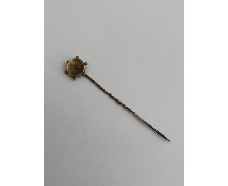 A 9CT GOLD AND DIAMOND STICK PIN, GROSS WEIGHT 0.6 G