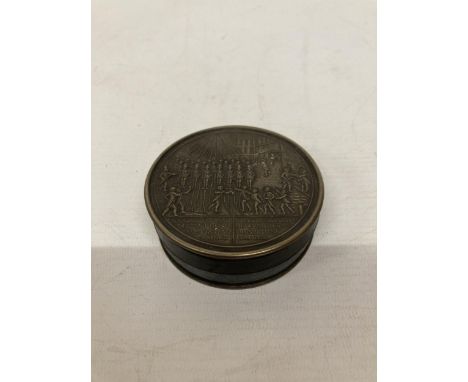 A FRENCH BRONZE BOIS DURCI SNUFF BOX GUARDS AT VERSAILLES