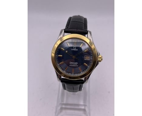 AN 18K GOLD AND STEEL OMEGA SEAMASTER AUTOMATIC CHRONOMETER MEN'S WRIST WATCH WITH 18K GOLD BEZEL 37MM SEEN WORKING BUT NO WA